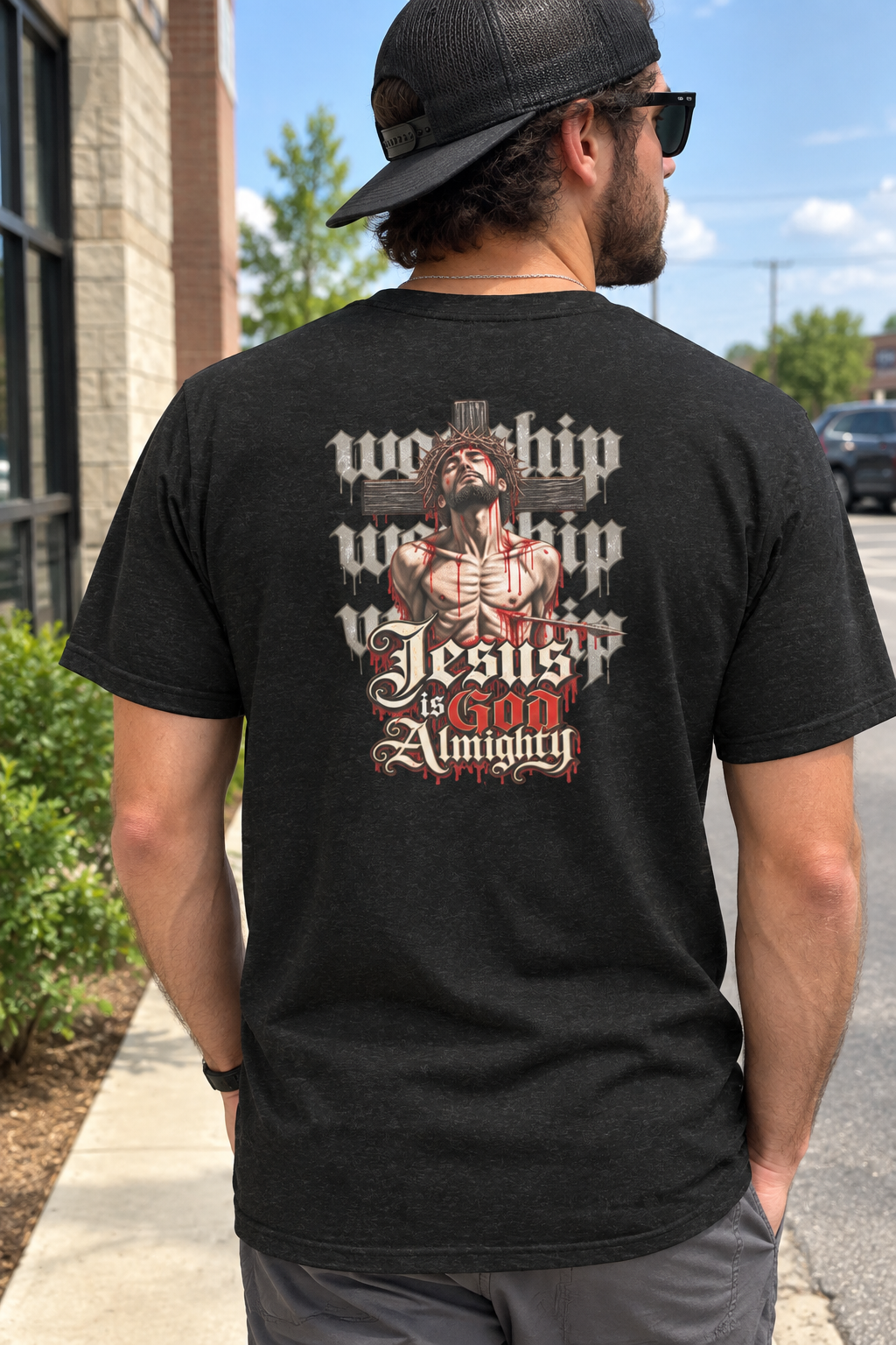 Model wearing Jesus is God tee